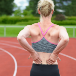 woman with lower back pain from fibromyalgia
