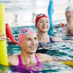 woman in water aerobics class for arthritis pain