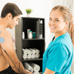 man receiving electrotherapy for muscle pain